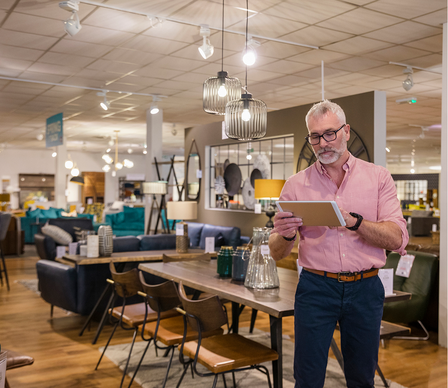 Electrician examining control panel components